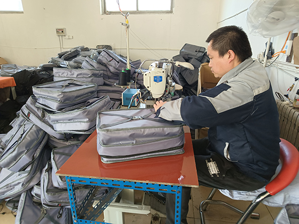 Laptop backpack sewing